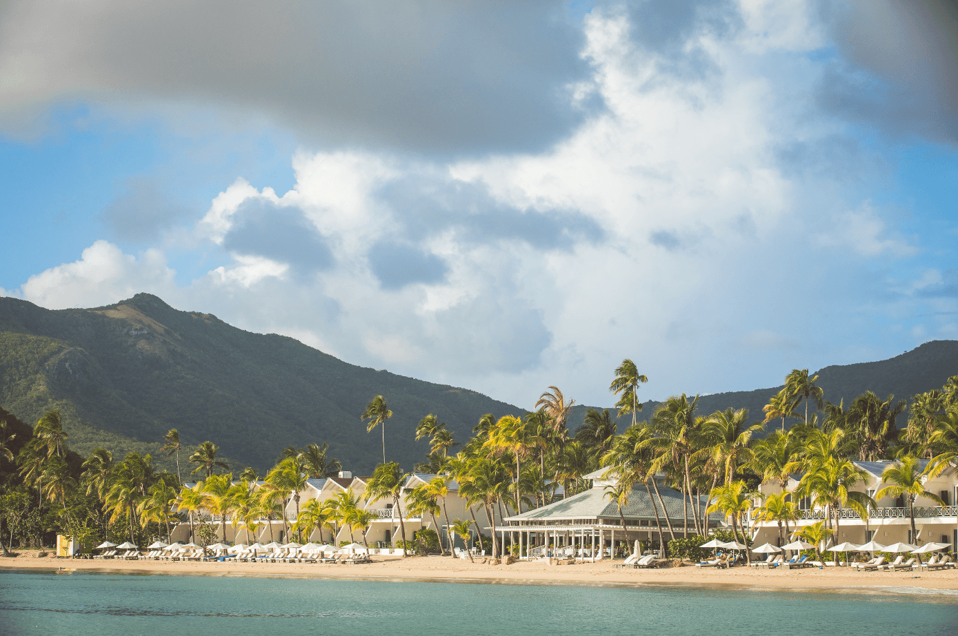 Image may contain Summer Building Tropical Hotel Resort and Outdoors