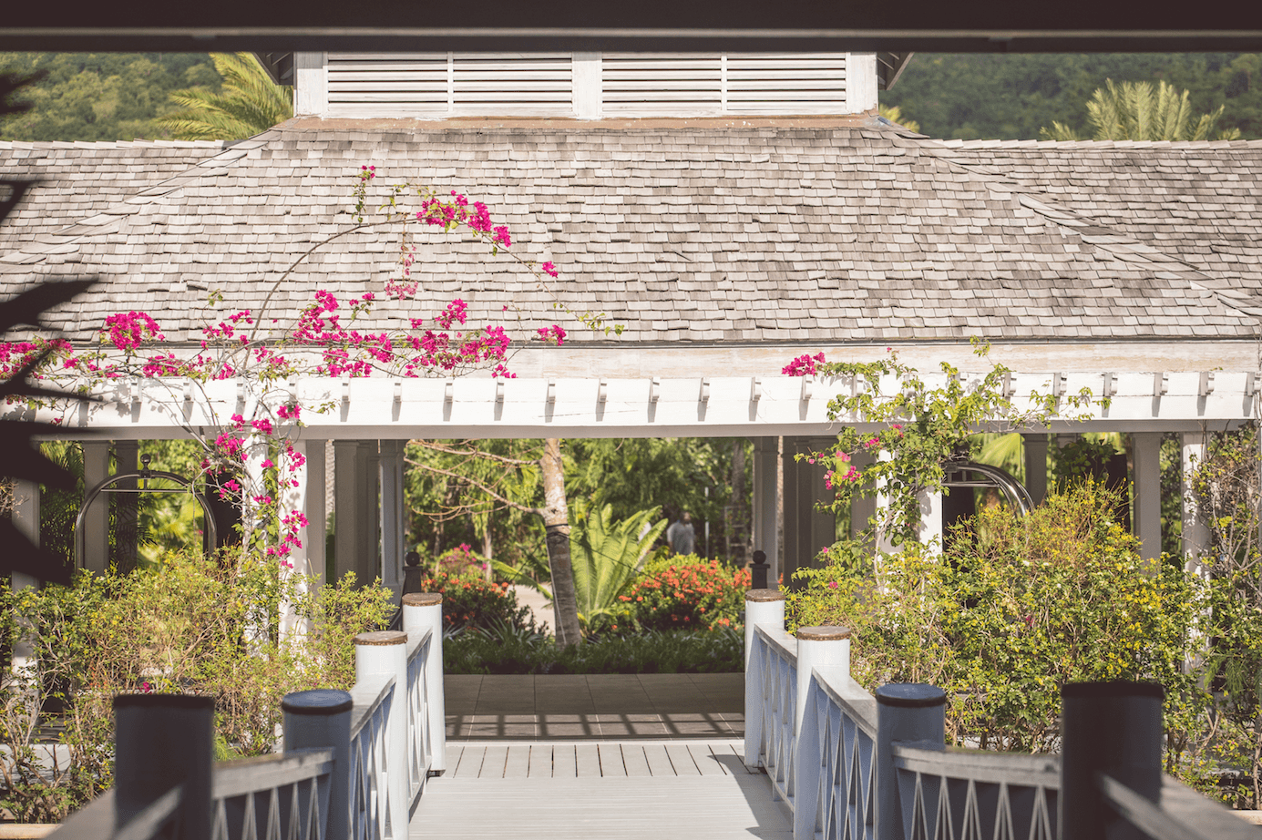 Image may contain Garden Arbour Outdoors Human Person Railing Porch and Patio