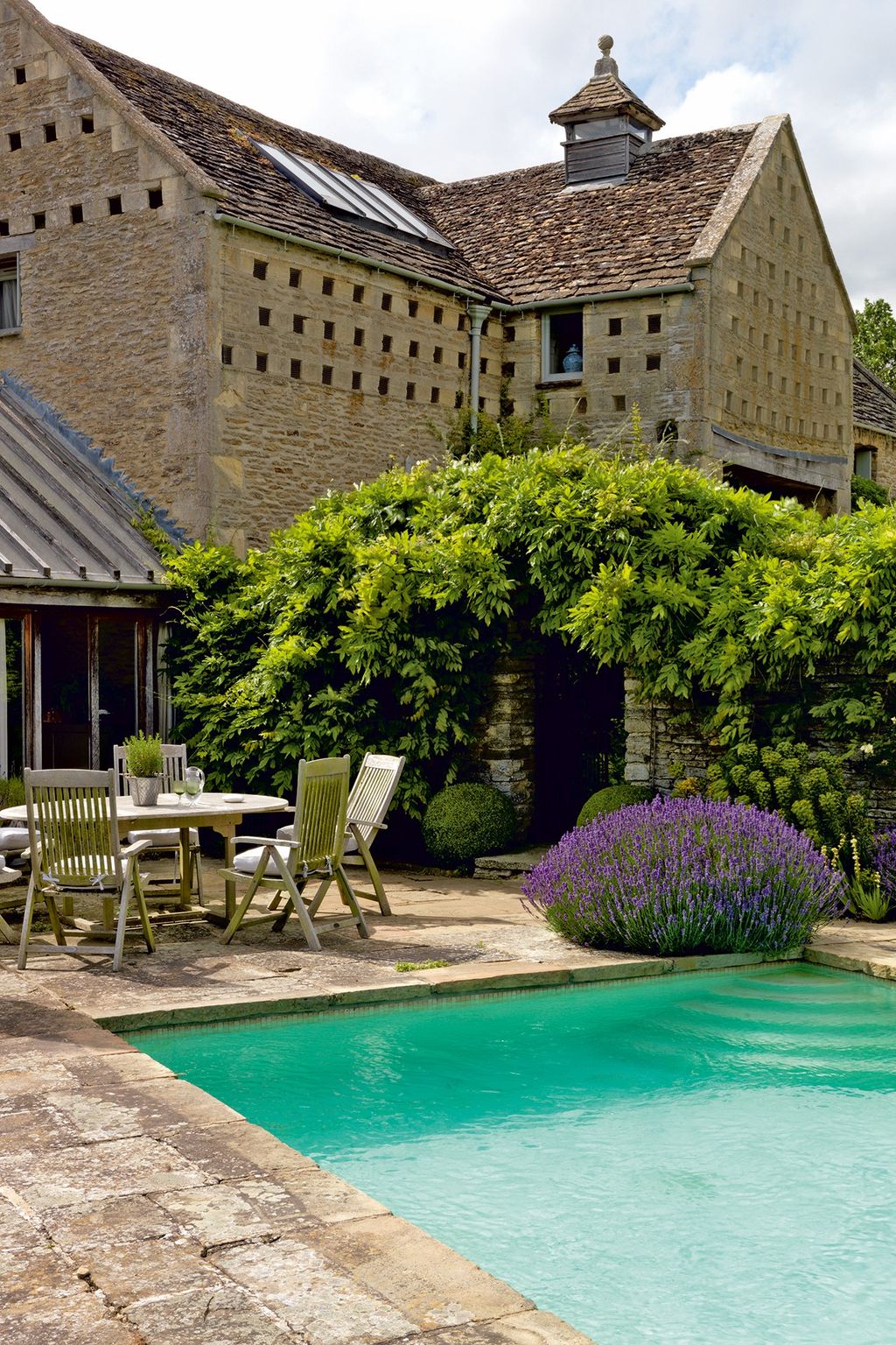 It is often considered a challenge to place a swimming pool in a beautifully bucolic setting without it visually...