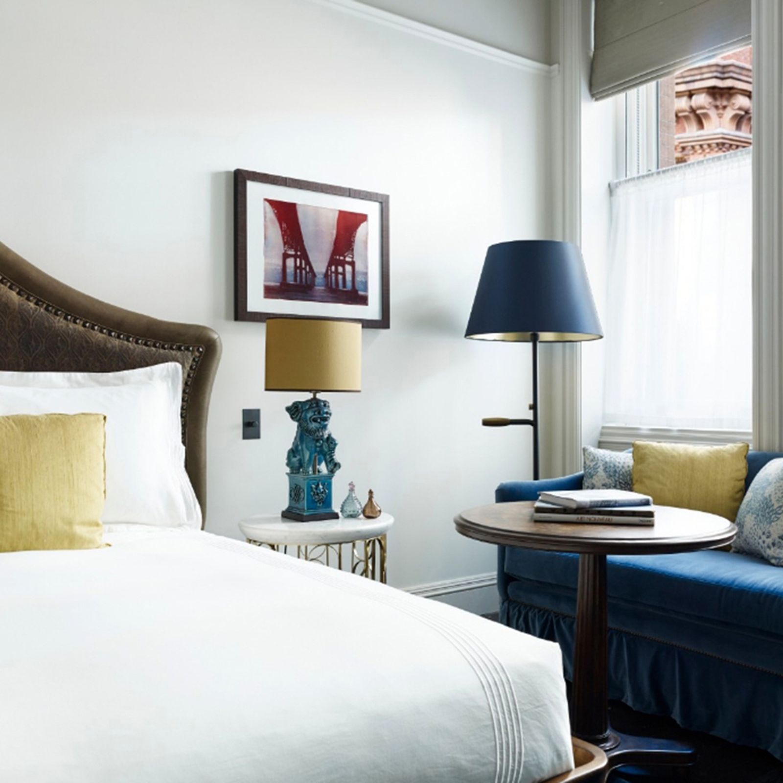 Image may contain Furniture Bed Lamp Table Lamp Room Indoors Bedroom and Interior Design