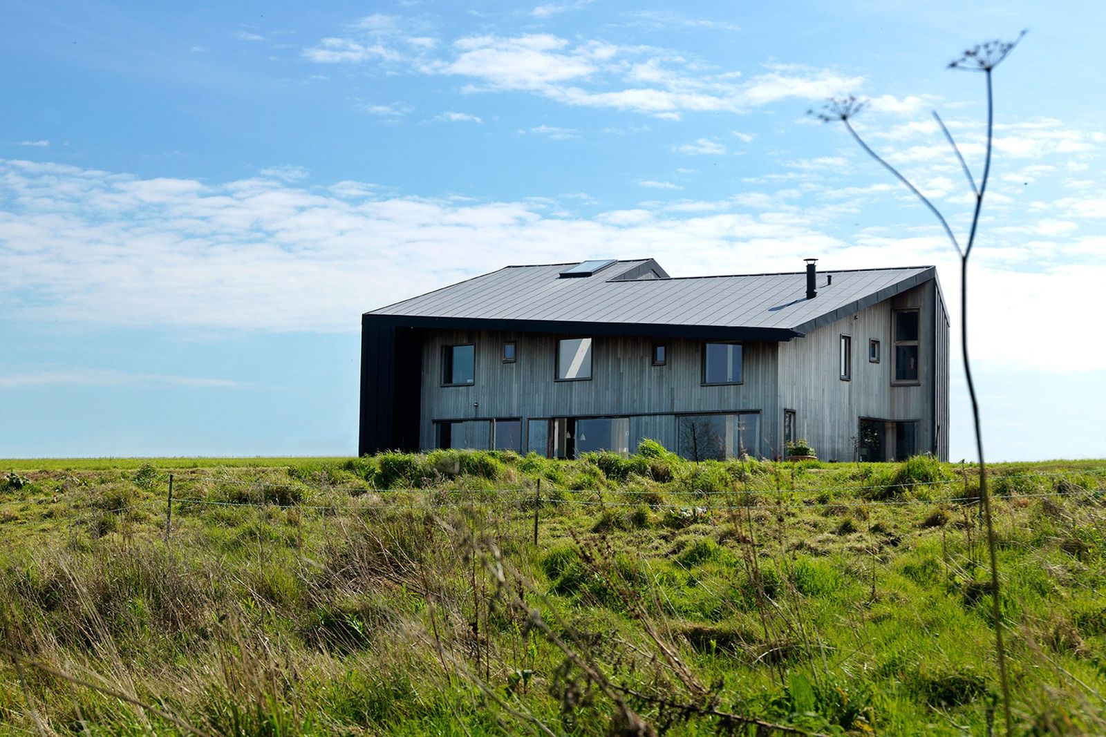 Image may contain Nature Housing Building Outdoors Cottage House Countryside Shelter Rural Hut Cabin and Shack
