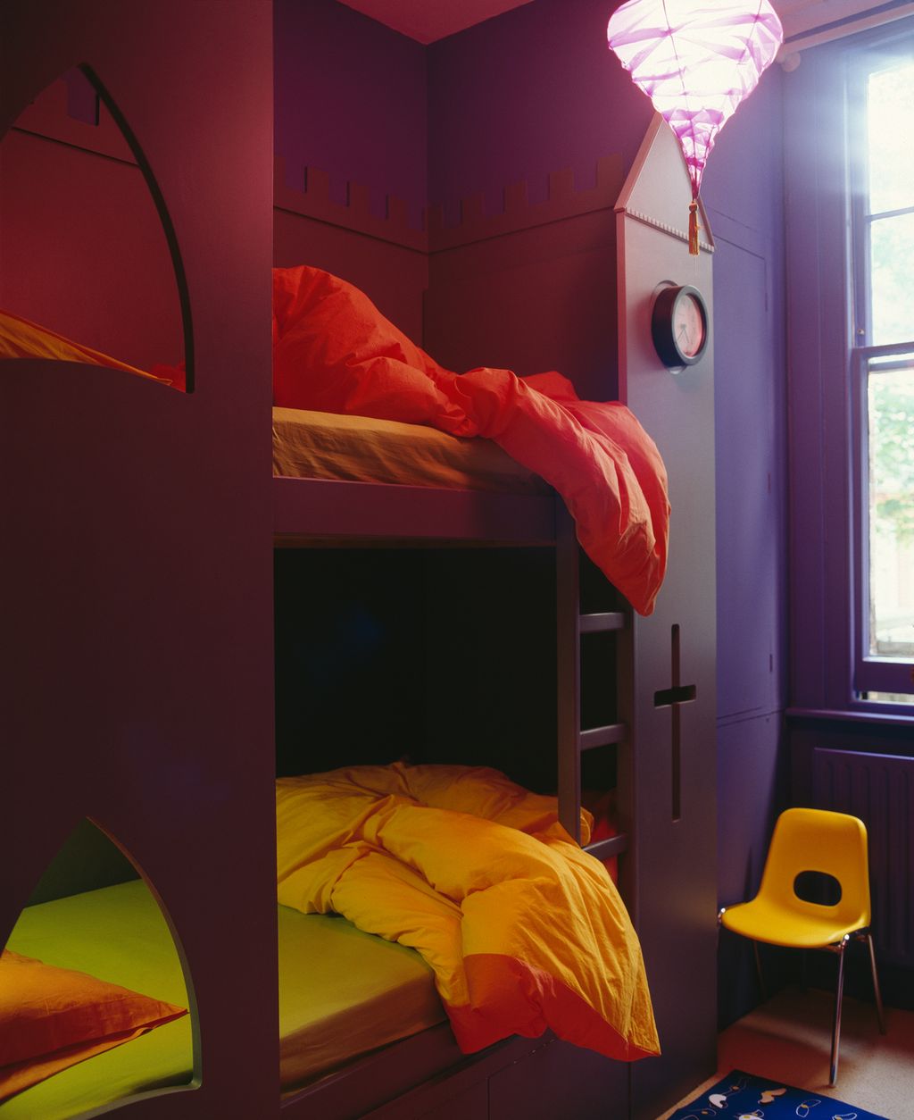 Image may contain Indoors Room Bedroom Dorm Room Furniture Chair and Bed