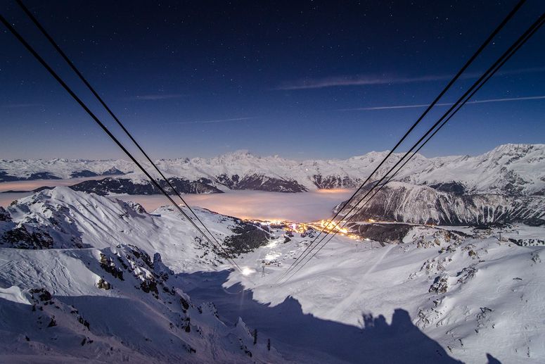 Image may contain: Vehicle, Transportation, Cable Car, Nature, Outdoors, and Mountain