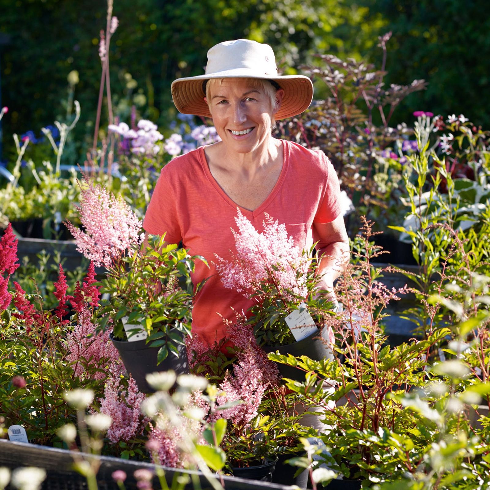 Image may contain Hat Clothing Apparel Garden Outdoors Human Person Gardener Worker and Gardening