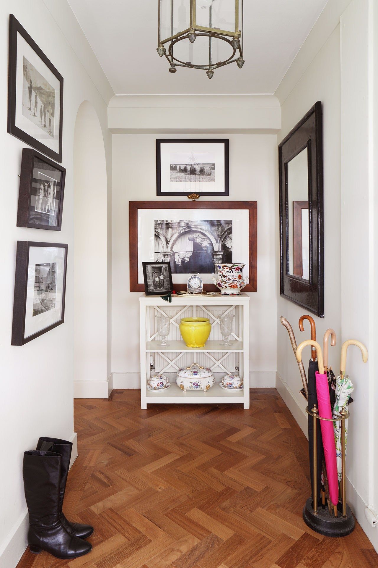 Image may contain Interior Design Indoors Wood Flooring Floor Corner Hardwood Furniture Home Decor and Shelf