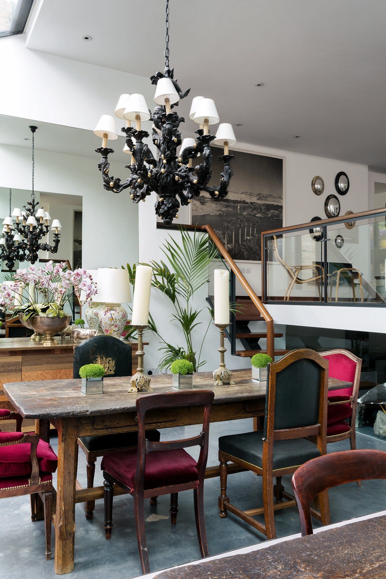 Image may contain Furniture Chair Interior Design Indoors Room Plant Living Room Lamp Dining Room and Table