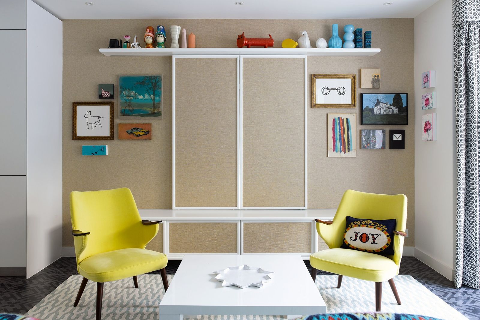 Image may contain Furniture Chair Indoors Room Interior Design Living Room and Shelf