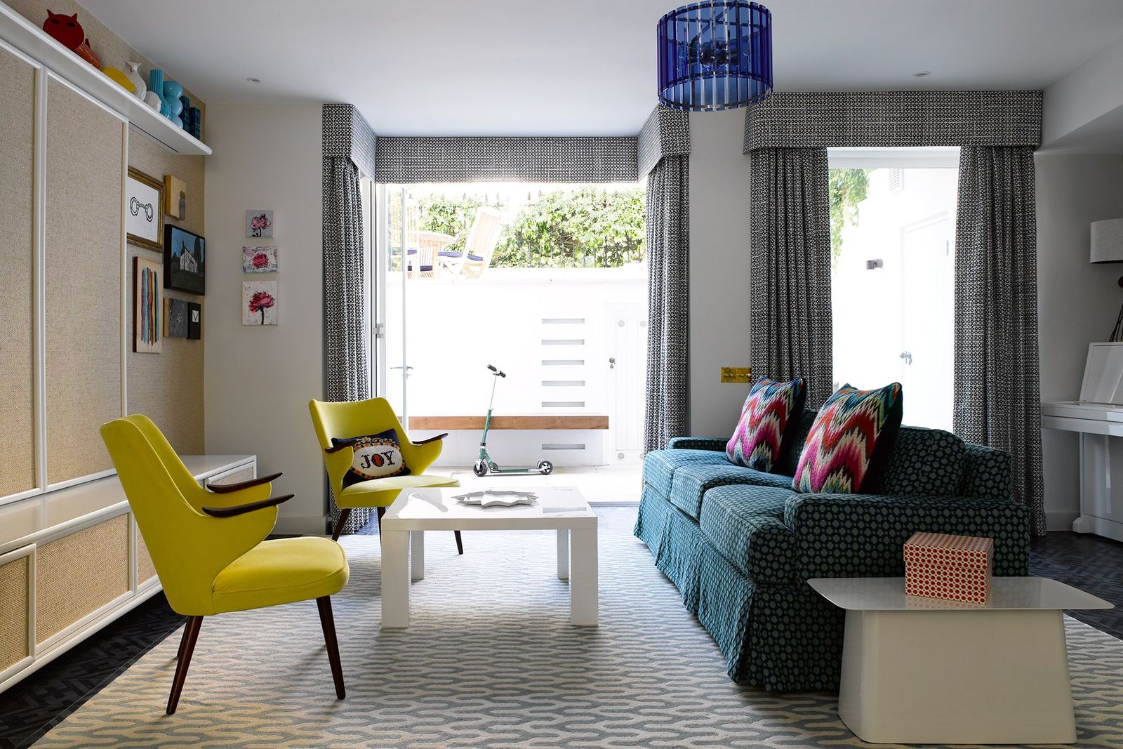 Image may contain Furniture Living Room Room Indoors Chair Couch Table Coffee Table Cushion and Interior Design