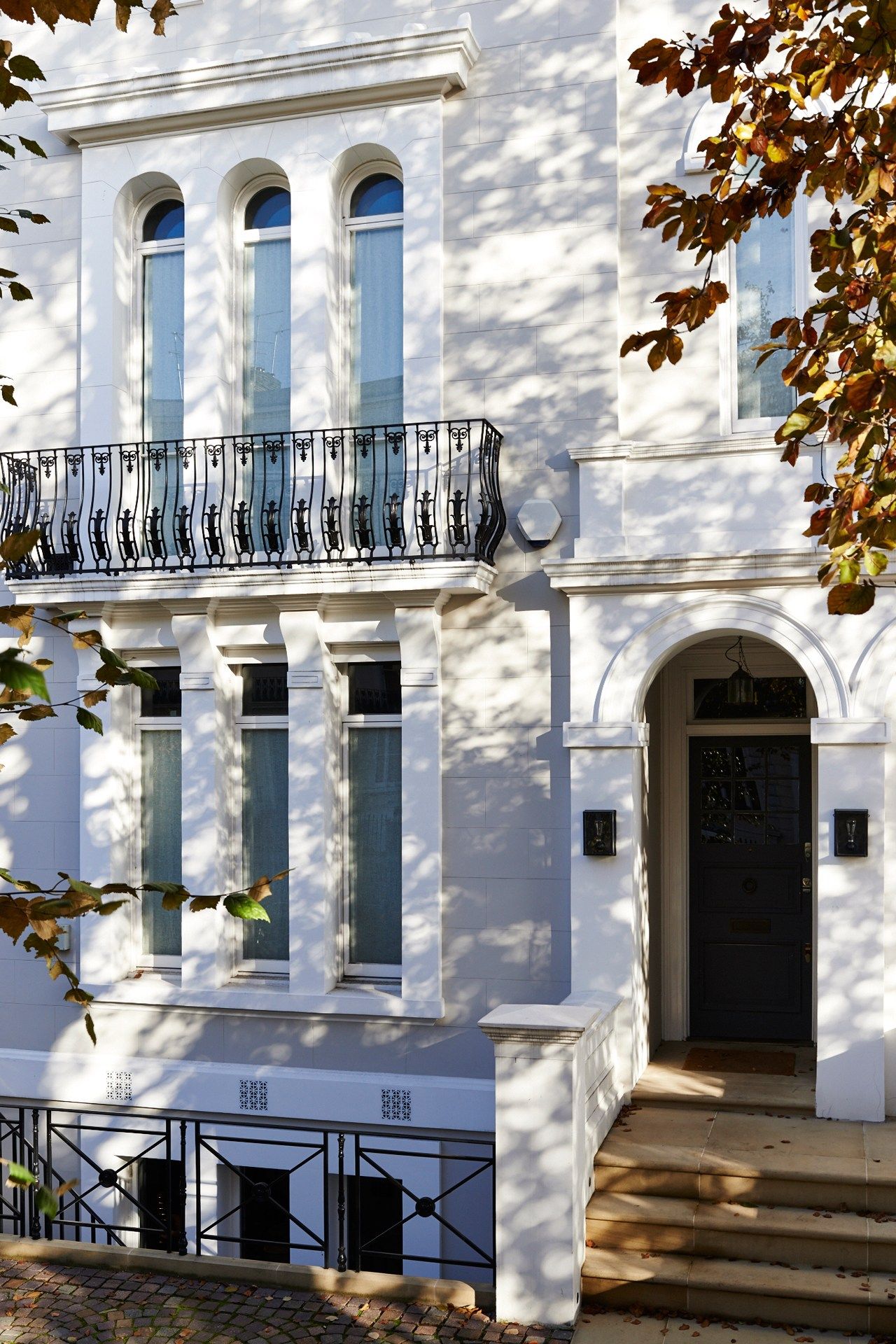 Image may contain Banister Handrail Door Home Decor and Railing