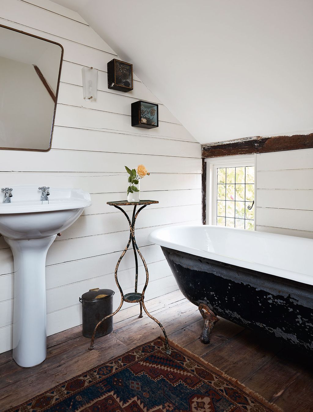 Image may contain Interior Design Indoors Tub Bathtub Room and Sink