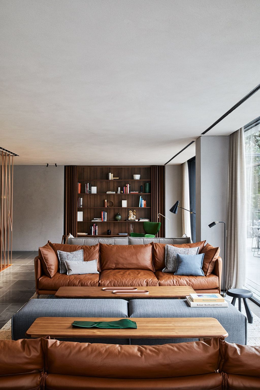 Image may contain Furniture Couch Living Room Indoors Room Interior Design Cushion Table and Home Decor