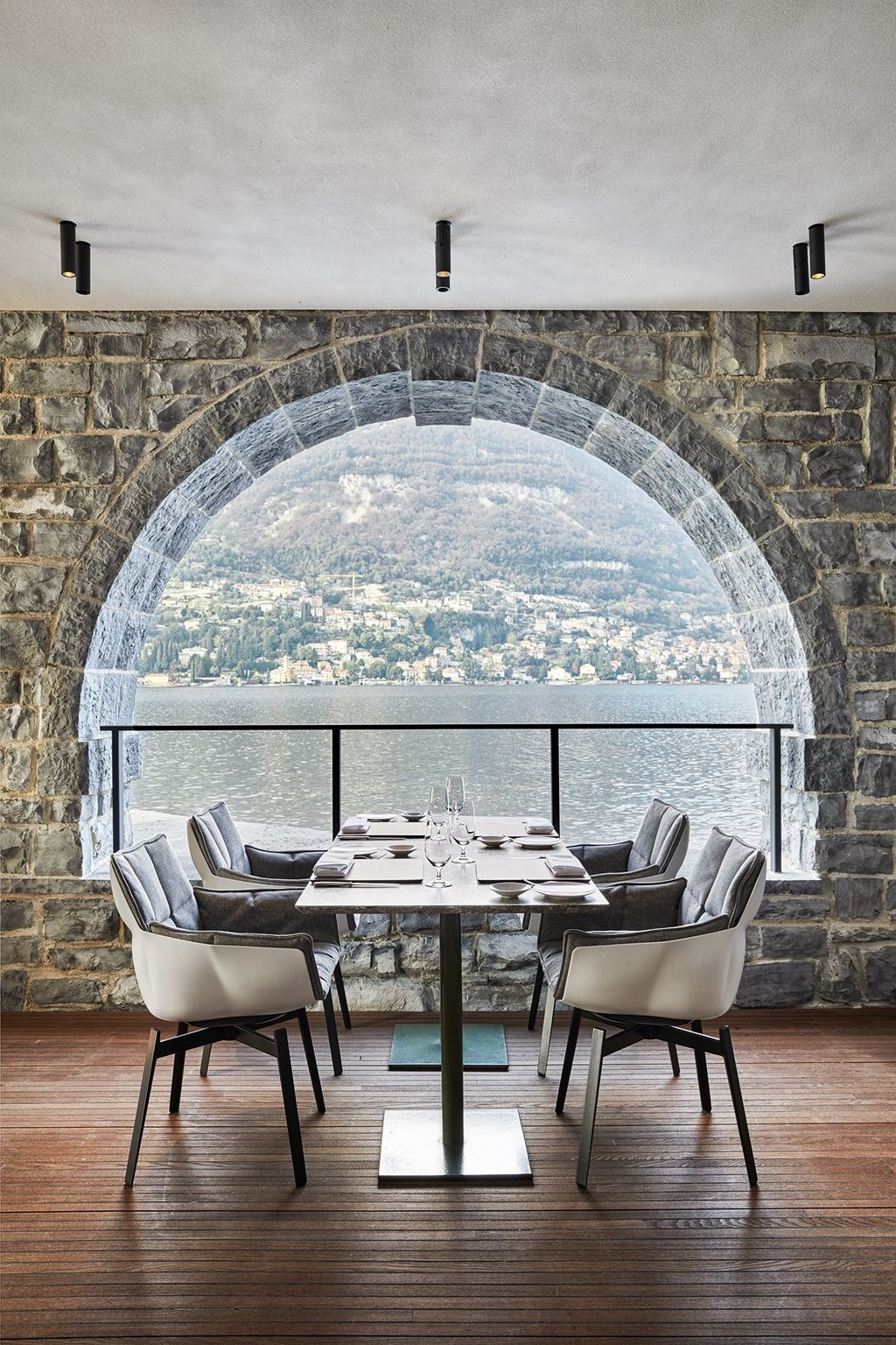 A covered outdoor dining area on the lower level.