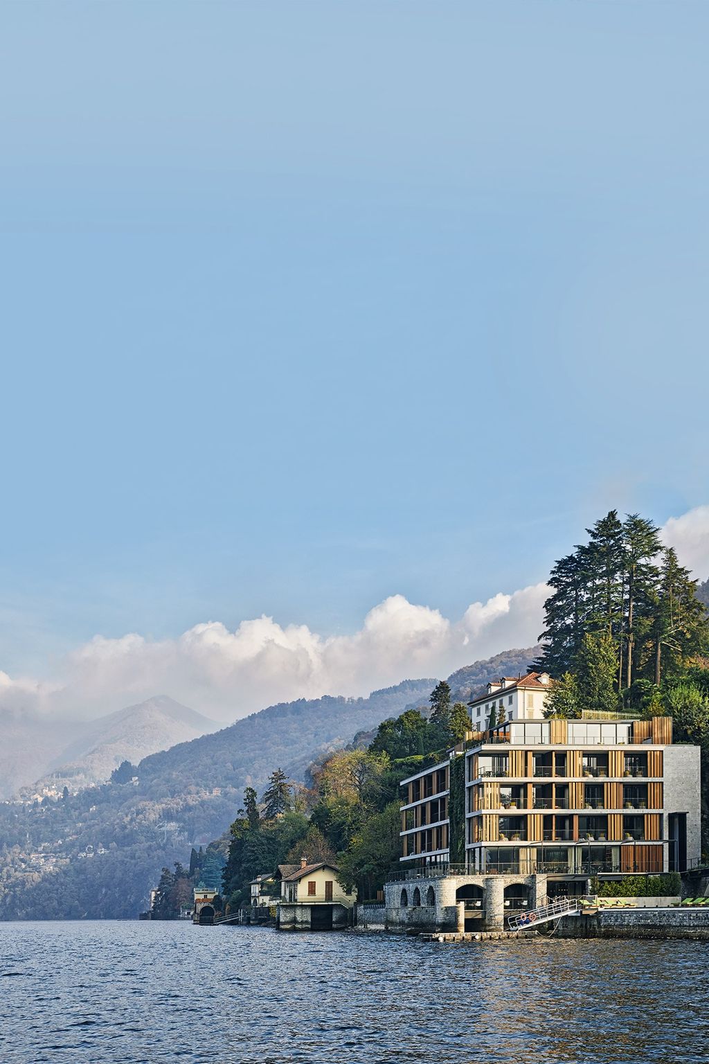 Image may contain Plant Tree Fir Abies Outdoors Nature Building Water Shoreline and Land