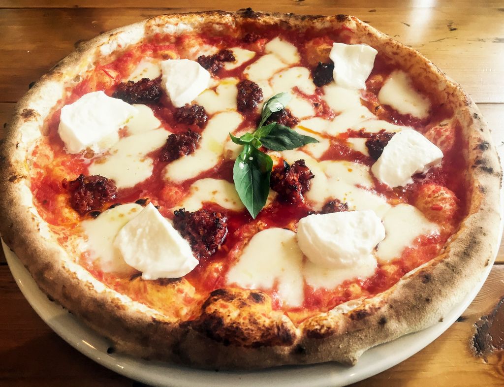 Image may contain Food Pizza Dish and Meal