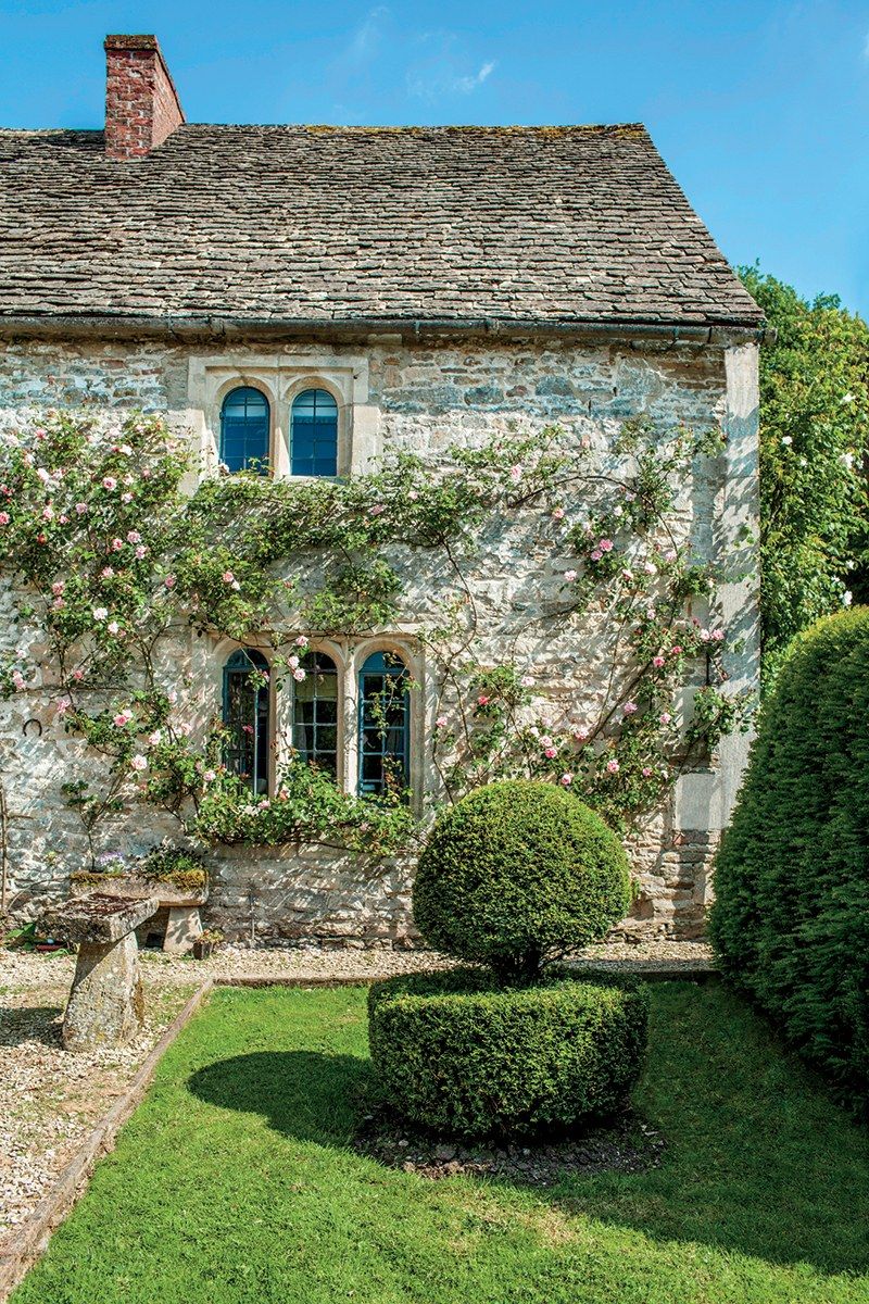 Image may contain Cottage Housing House Building Grass Plant Outdoors and Villa