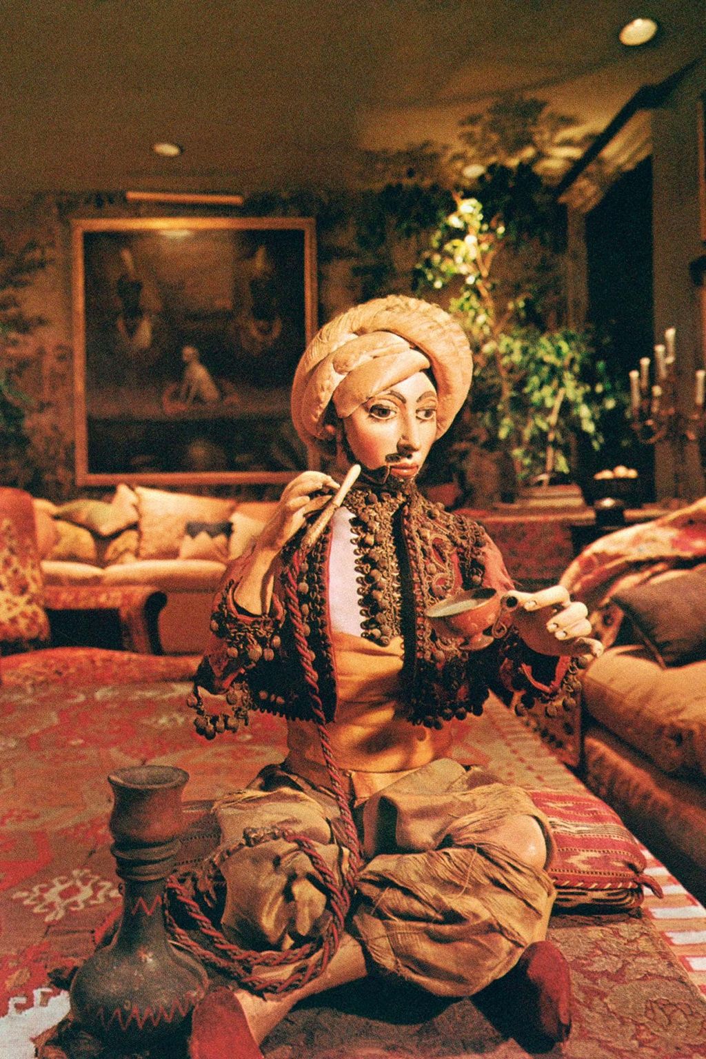 'Antique crewelwork curtains diffused any bright sunlight that might pierce the romantic gloom inside the apartment....