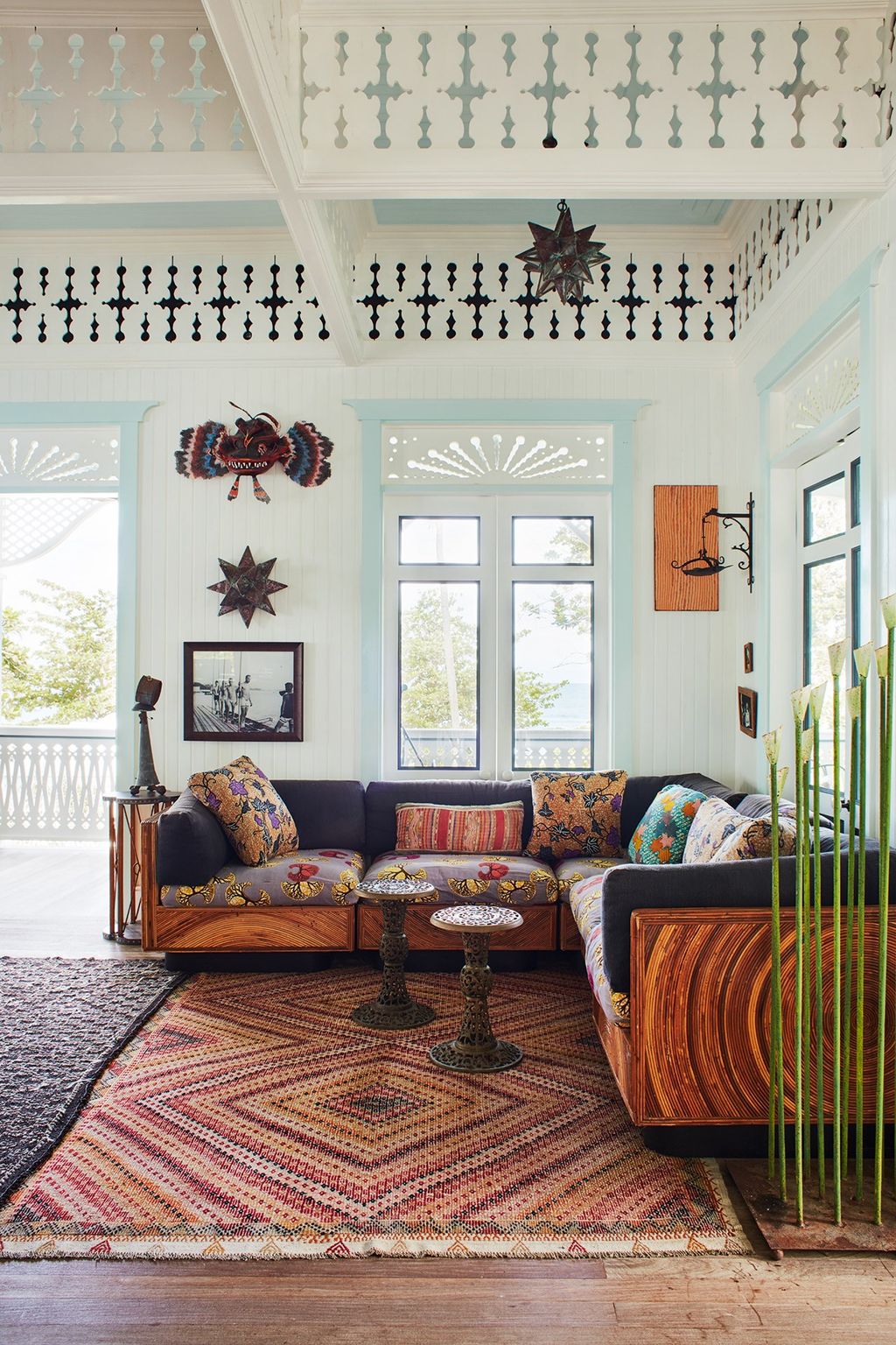 Image may contain Living Room Room Indoors Furniture Rug Couch Table and Cushion