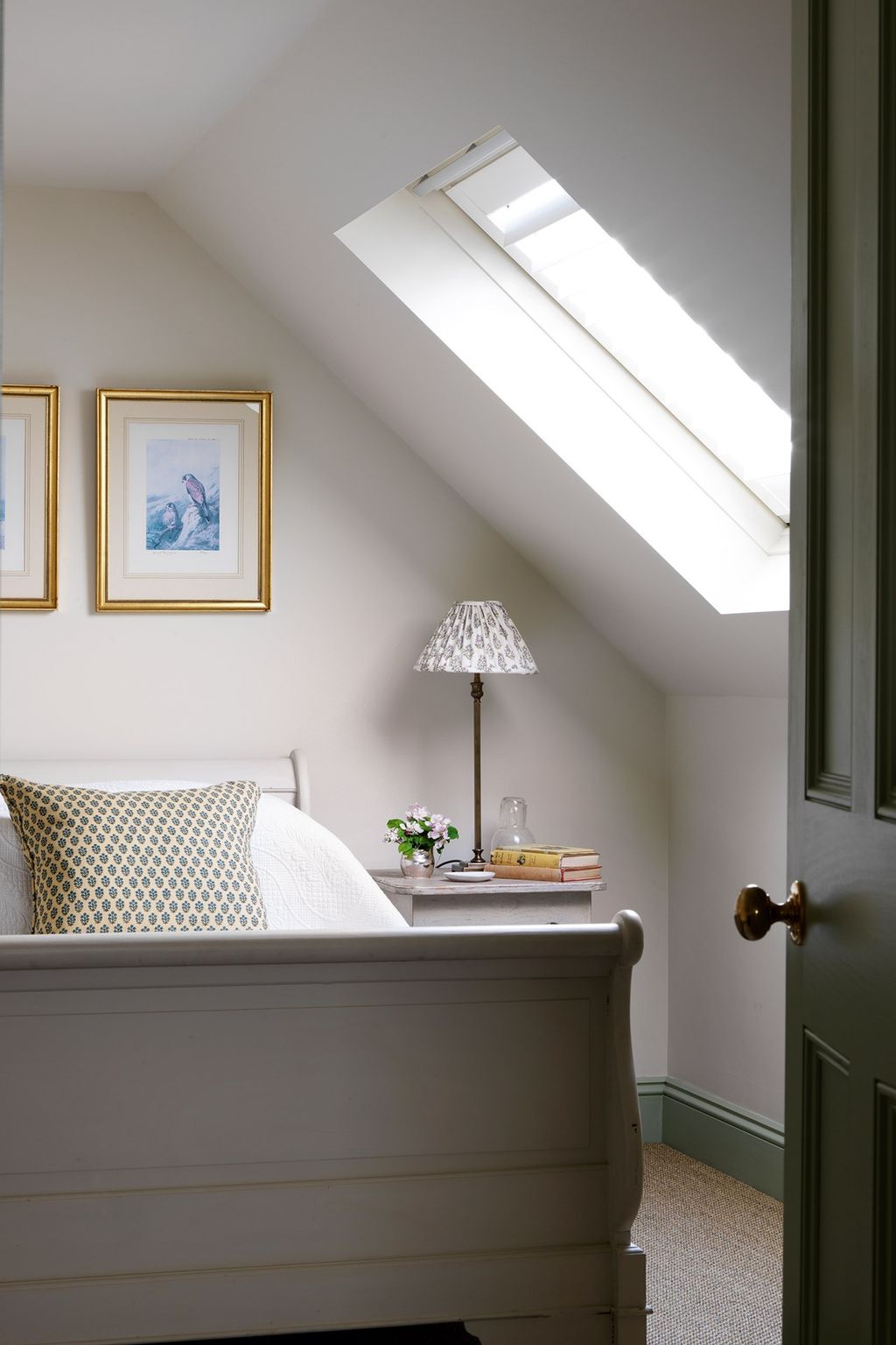 Image may contain Housing Building Indoors Loft Interior Design Attic Room Bedroom Cushion and Pillow