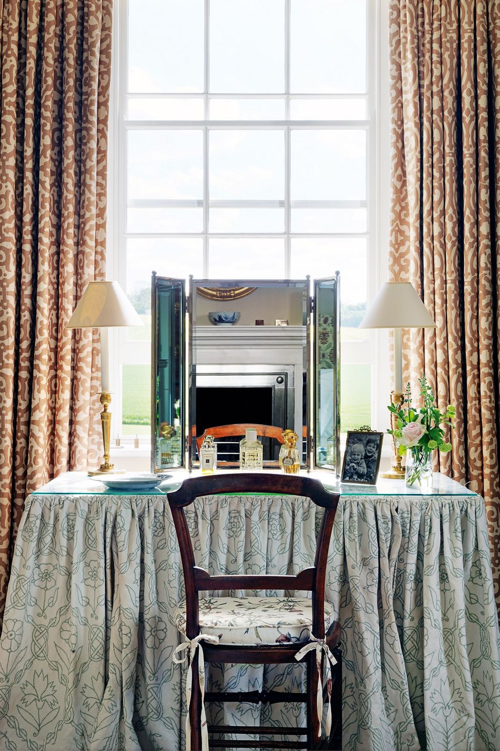 Image may contain Home Decor Indoors Room Furniture Chair Living Room Tablecloth Dining Room and Interior Design