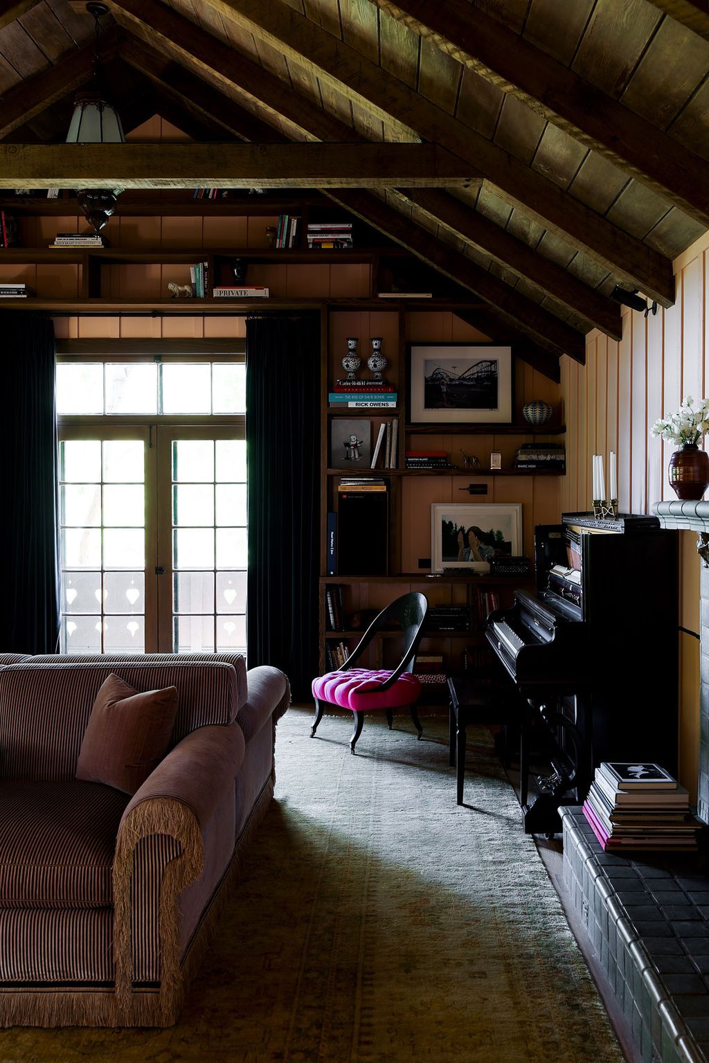 In what was originally a dance hall Shamshiri created a music room for entertaining divided into two distinct seating...