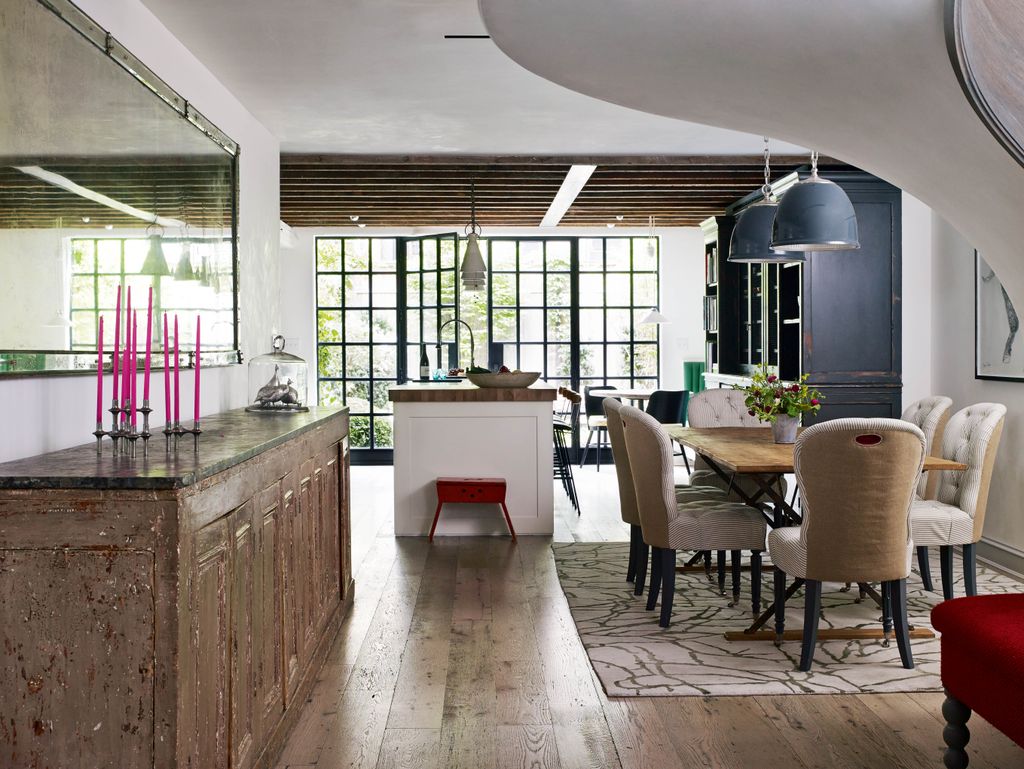 Image may contain Flooring Furniture Chair Floor Room Indoors Interior Design Wood and Hardwood