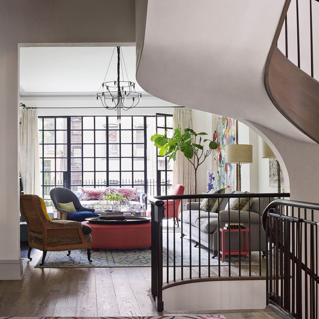 Image may contain Banister Handrail Living Room Room Indoors Interior Design Railing and Furniture