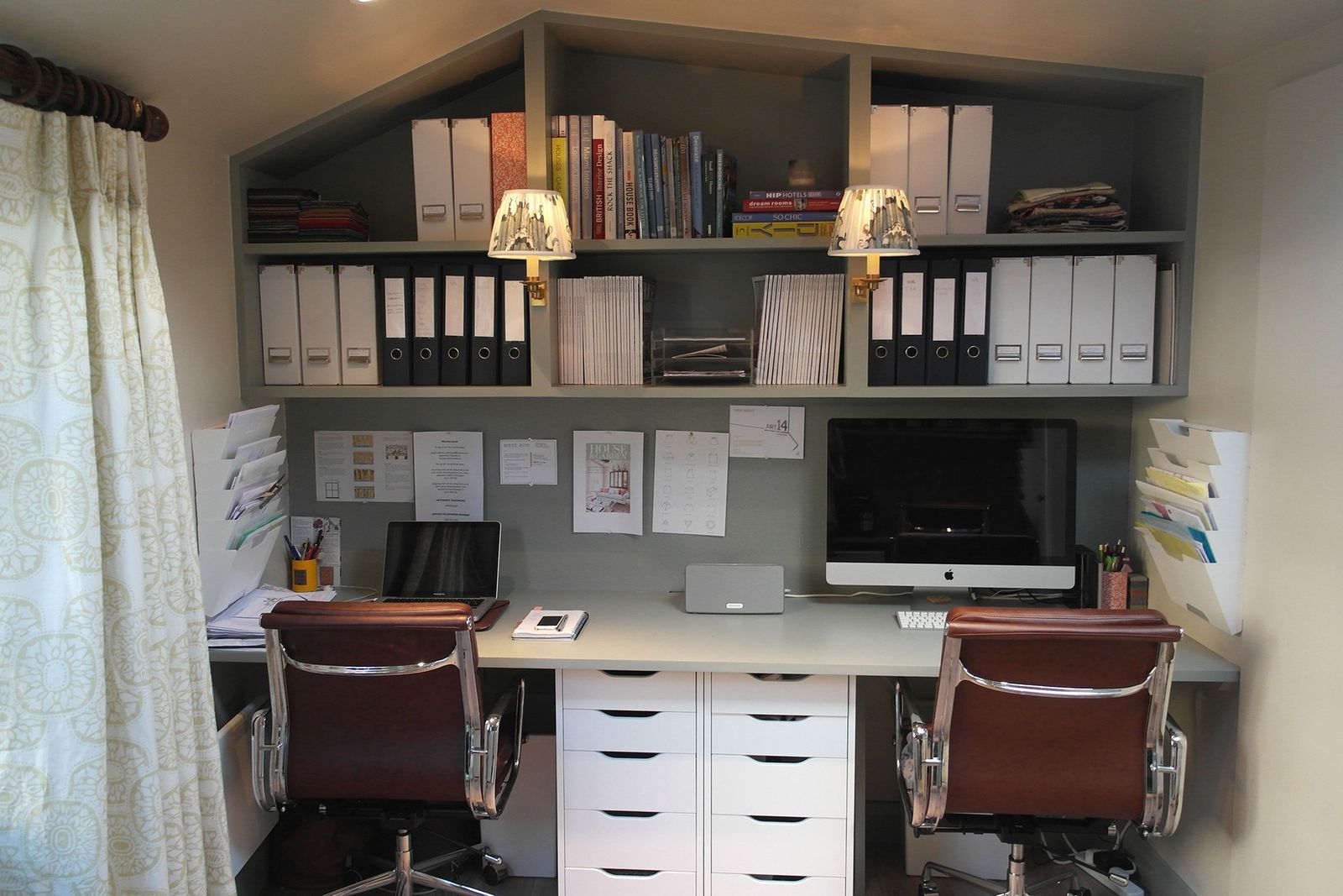 Image may contain Furniture Table Desk Chair Shelf Electronics Monitor Display Screen Lcd Screen and Bookcase