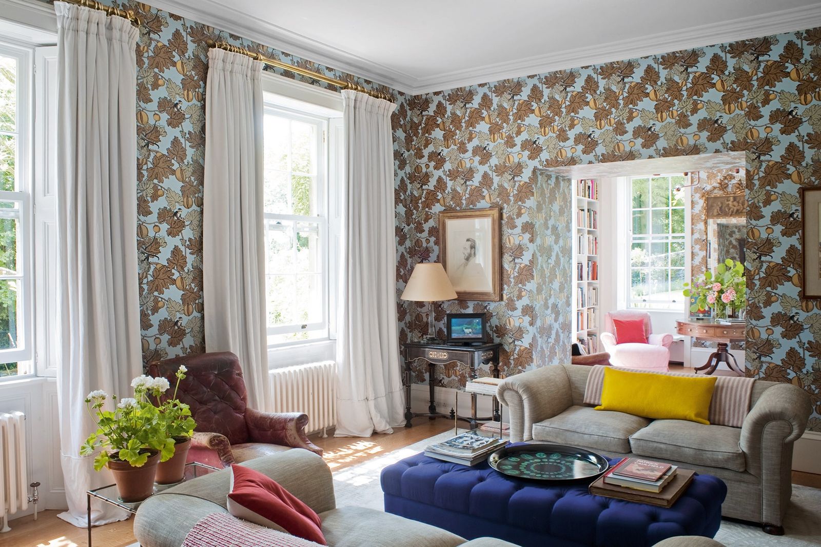 Image may contain Furniture Living Room Indoors Room Couch Interior Design and Cushion