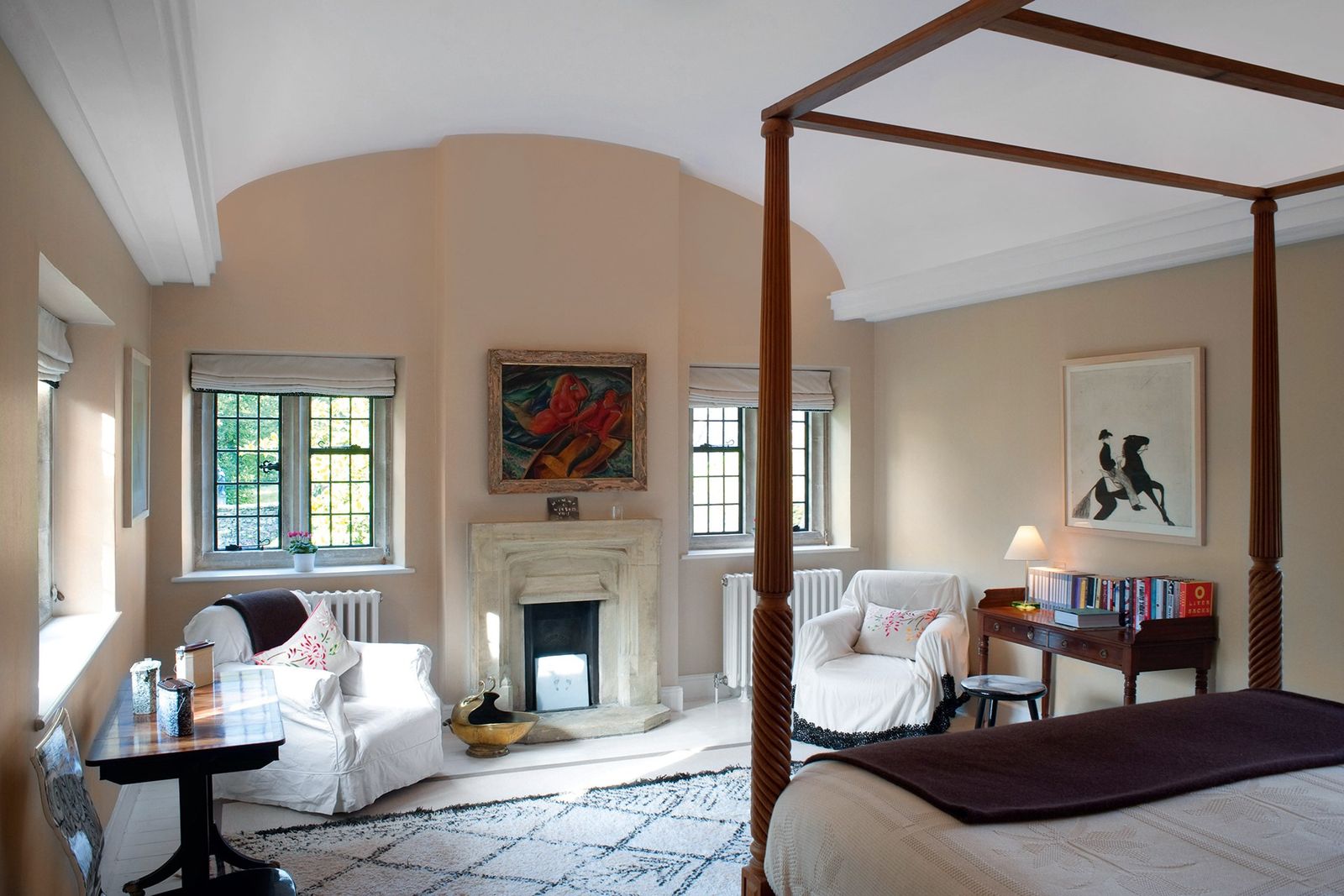 Image may contain Indoors Room Living Room Bedroom Furniture Interior Design Fireplace and Hearth