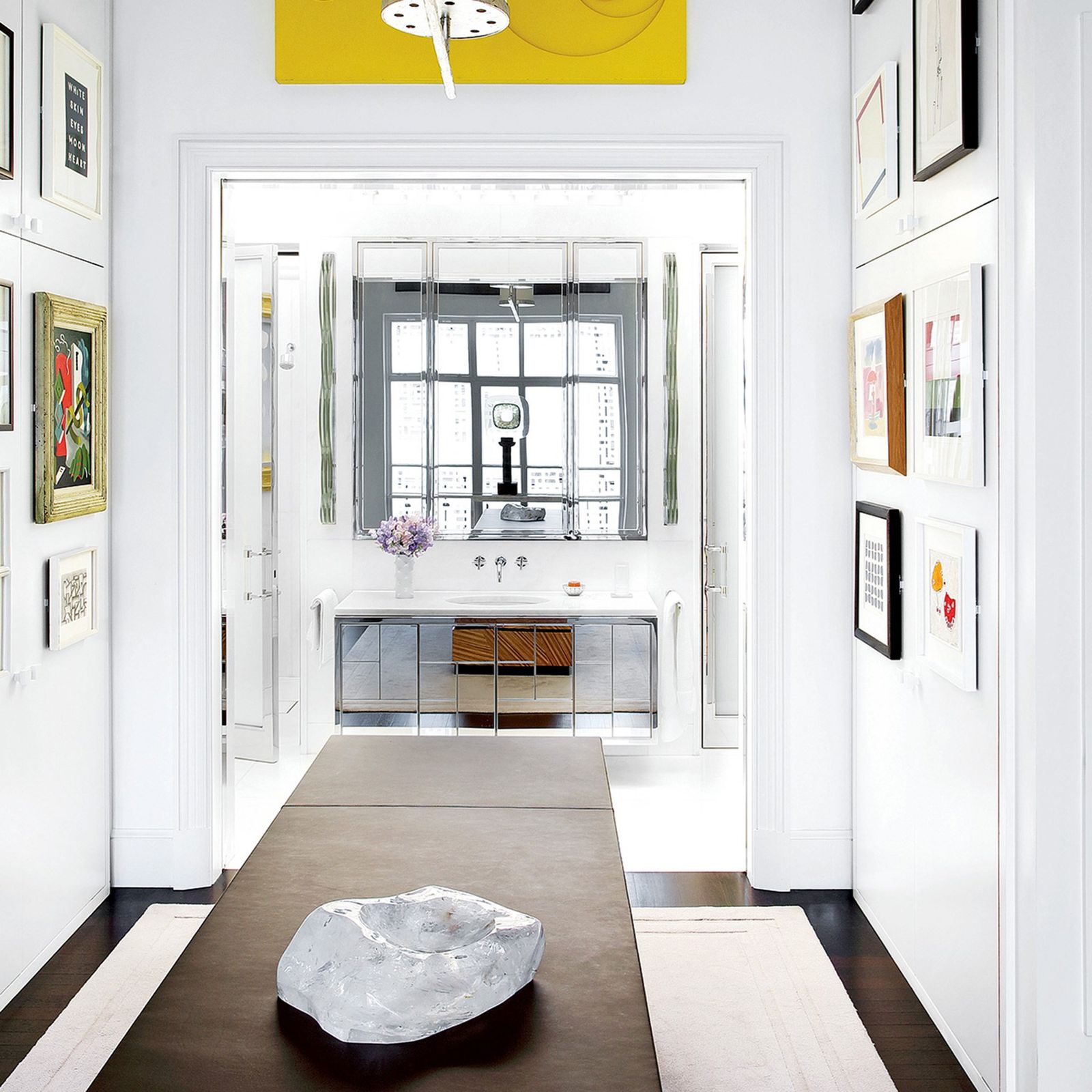 Image may contain Interior Design Indoors Room Flooring Living Room Furniture Lobby and Floor