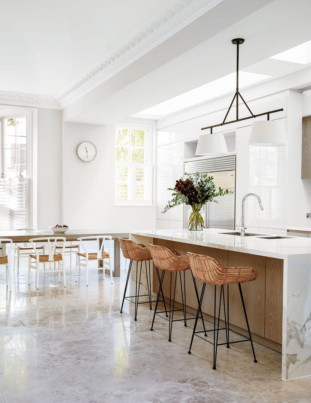 Kitchen Seating in a mix of styles including bar stools from Cox  Cox creates a relaxed feel.