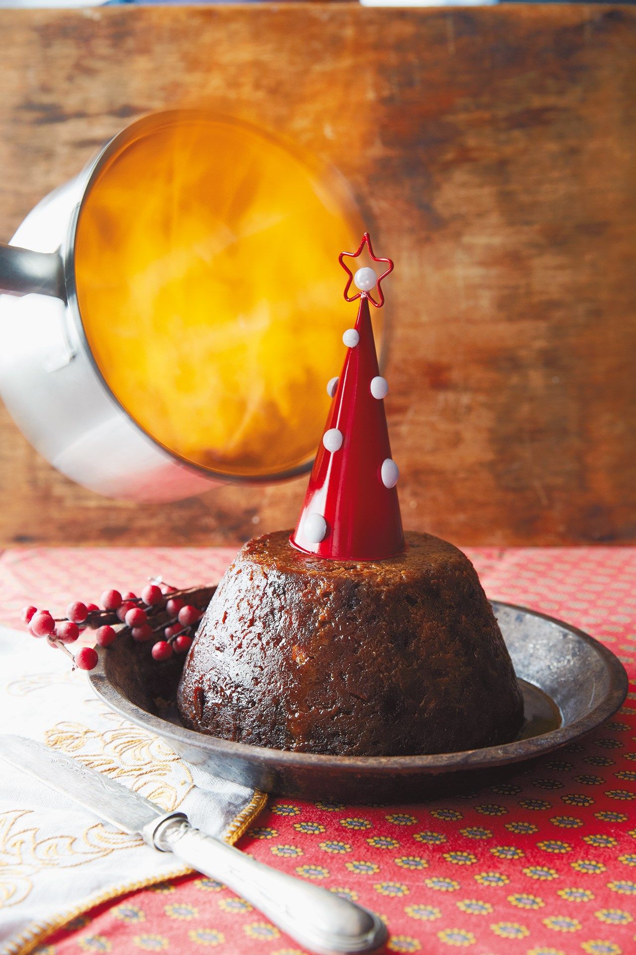 Image may contain Clothing Apparel Food Dessert Cake Party Hat Hat Confectionery and Sweets