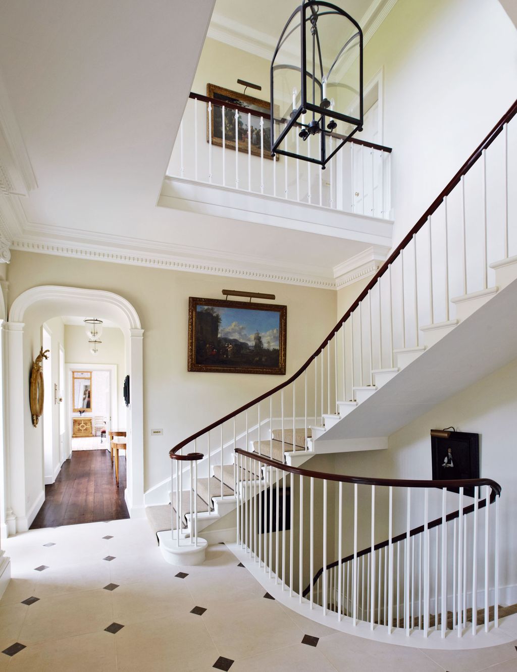 Image may contain Banister Handrail Floor Staircase Flooring Interior Design Indoors Wood and Hardwood