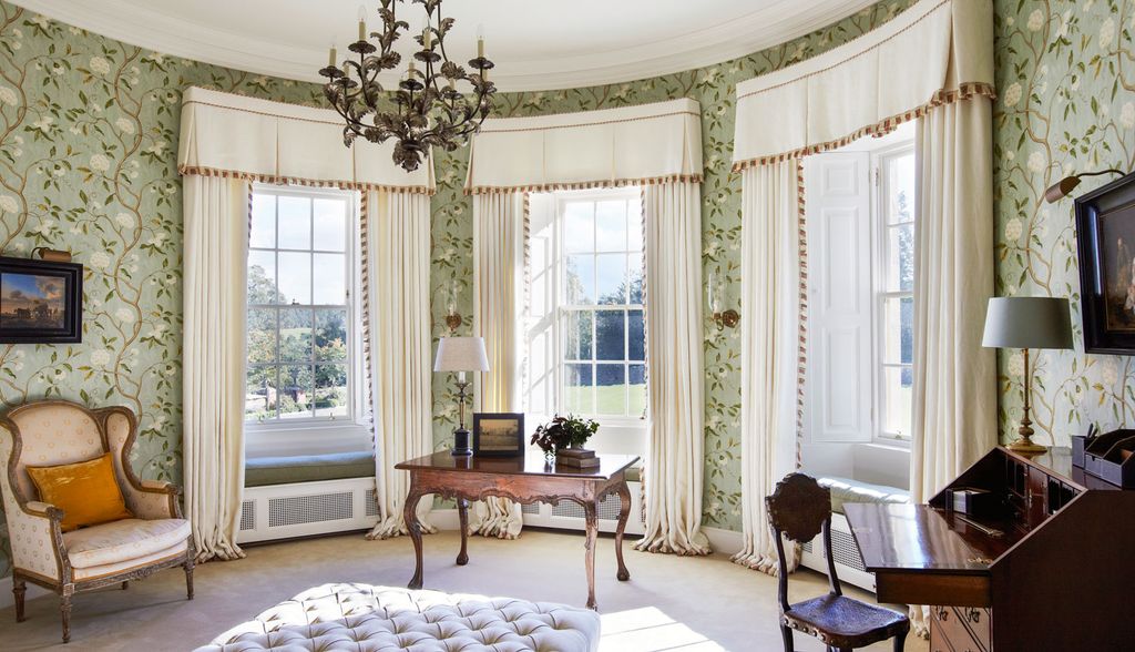 Image may contain Furniture Chair Picture Window and Rug