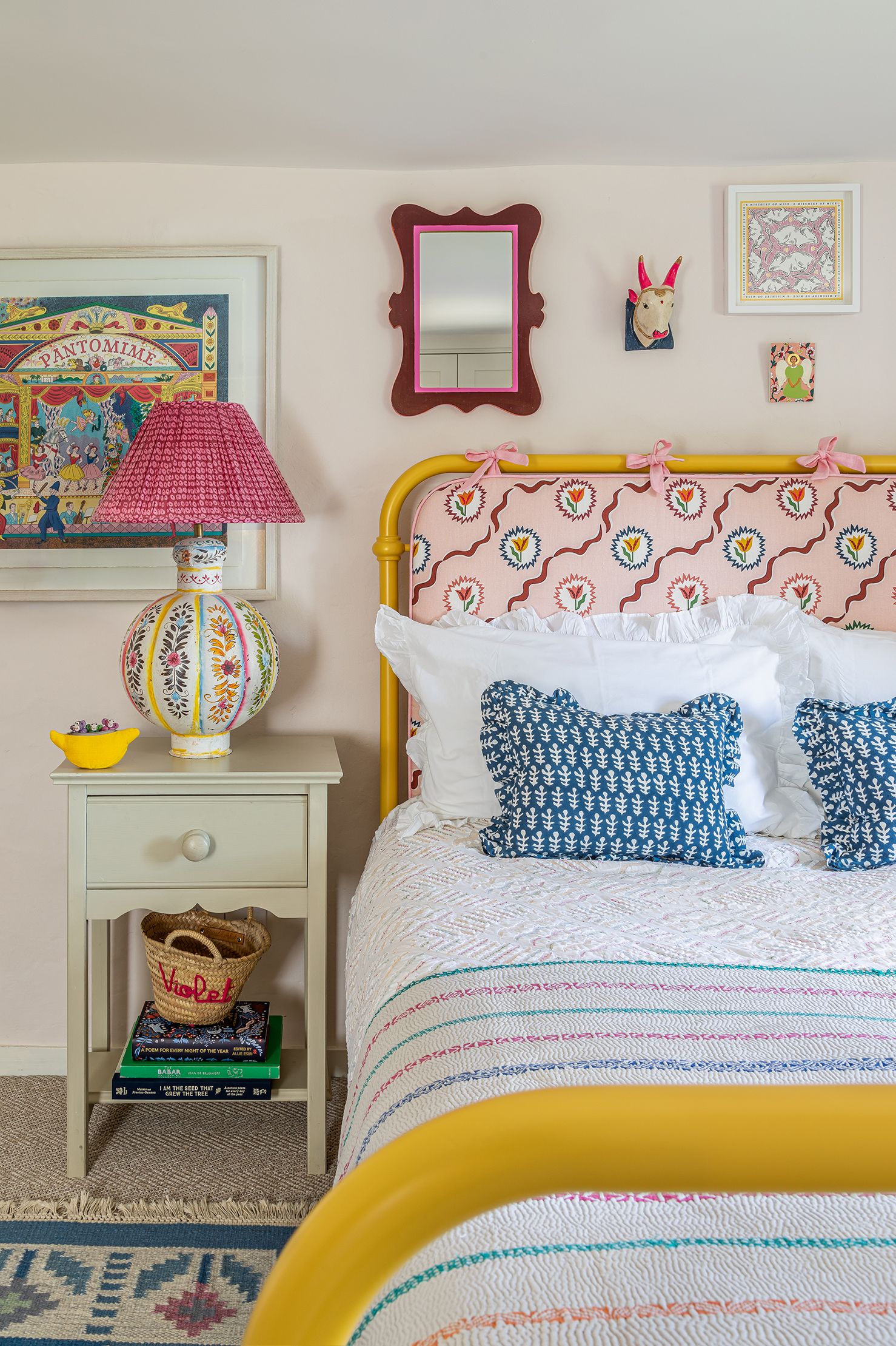 Image may contain Cushion Pillow Indoors Room Bedroom Lamp Table Lamp Furniture and Bed