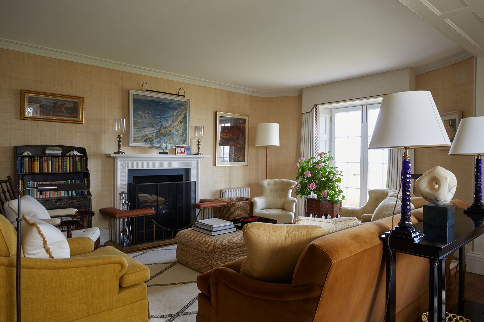 Image may contain Living Room Room Indoors Furniture Couch Interior Design Electronics Monitor Display and Screen