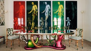 The dining room is filled with rich vibrant color with a dreamlike Abyss table in colored bronze and steel by Mattia...