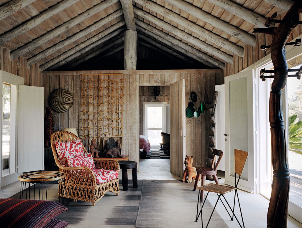 Image may contain Flooring Wood Furniture Living Room Room Indoors Floor Housing Building and Chair