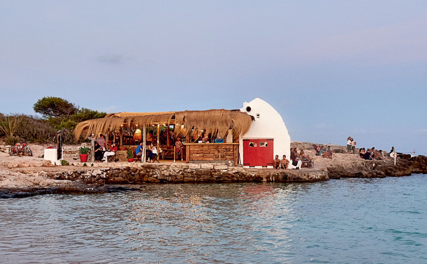 Image may contain Human Person Building Nature Shelter Countryside Rural Outdoors Water and Architecture