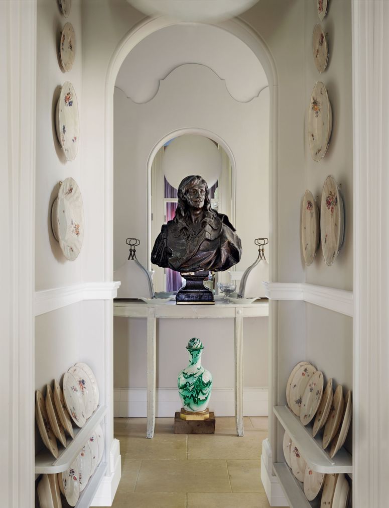 Image may contain: Shelf, Human, Person, Floor, Interior Design, Indoors, and Flooring