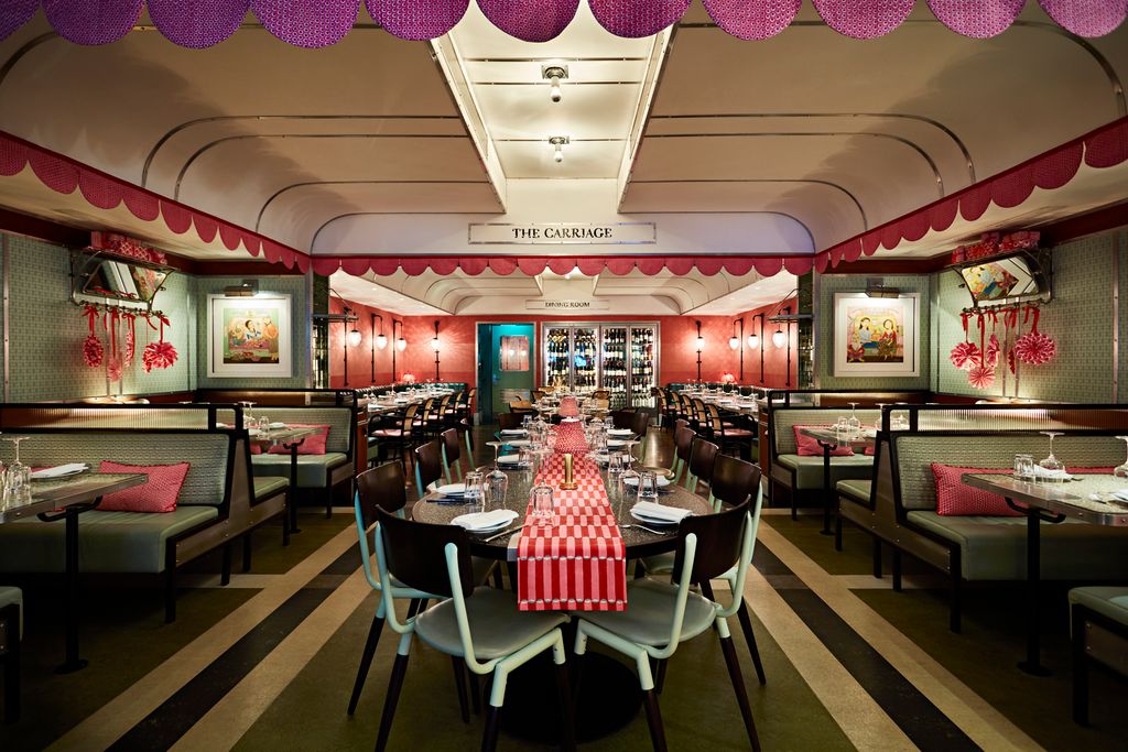 Image may contain Restaurant Furniture Chair Interior Design Indoors Food Meal Cafe and Cafeteria