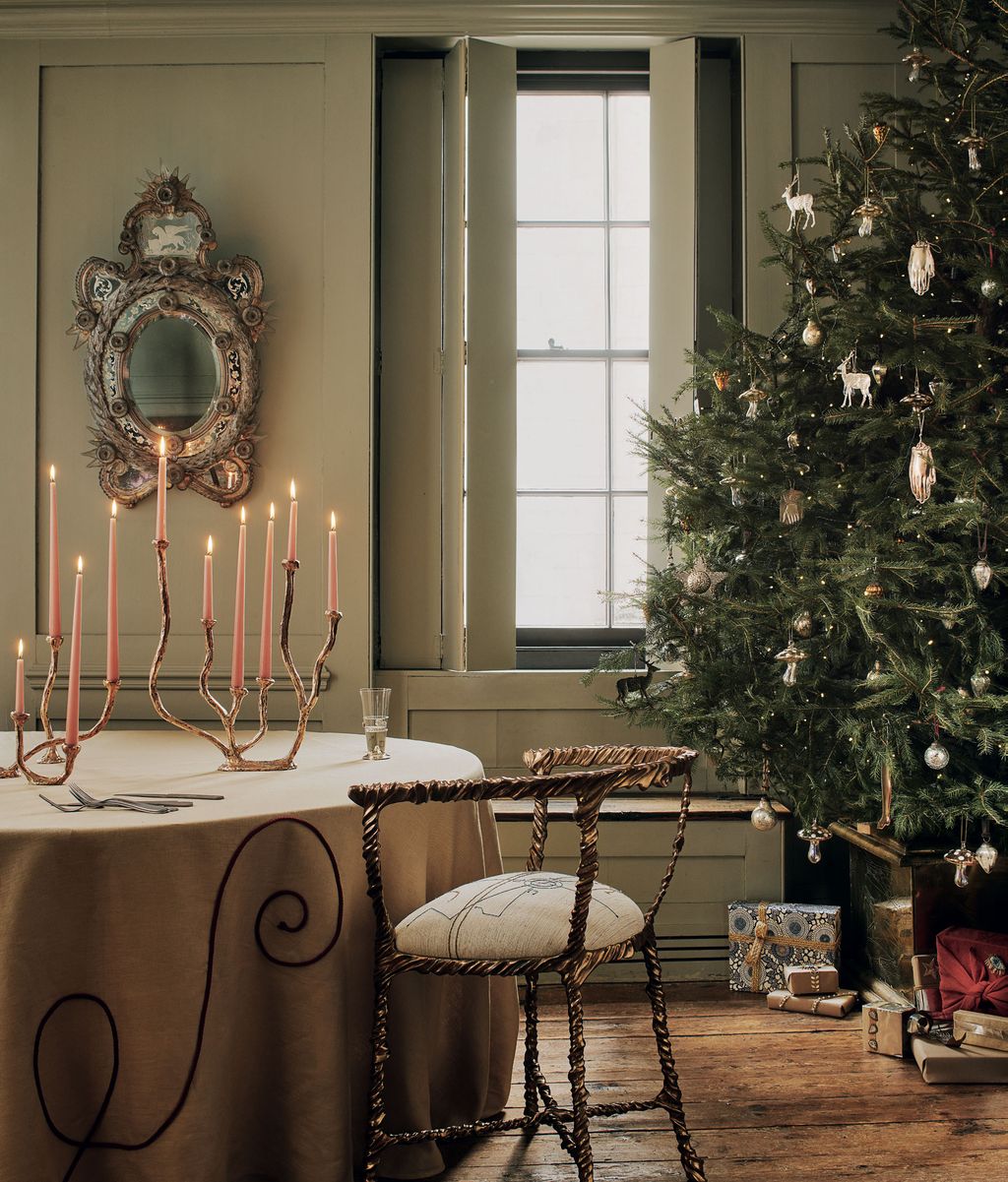 Image may contain Plant Flooring Wood Tree Furniture Ornament Christmas Tree Living Room Room Indoors and Hardwood