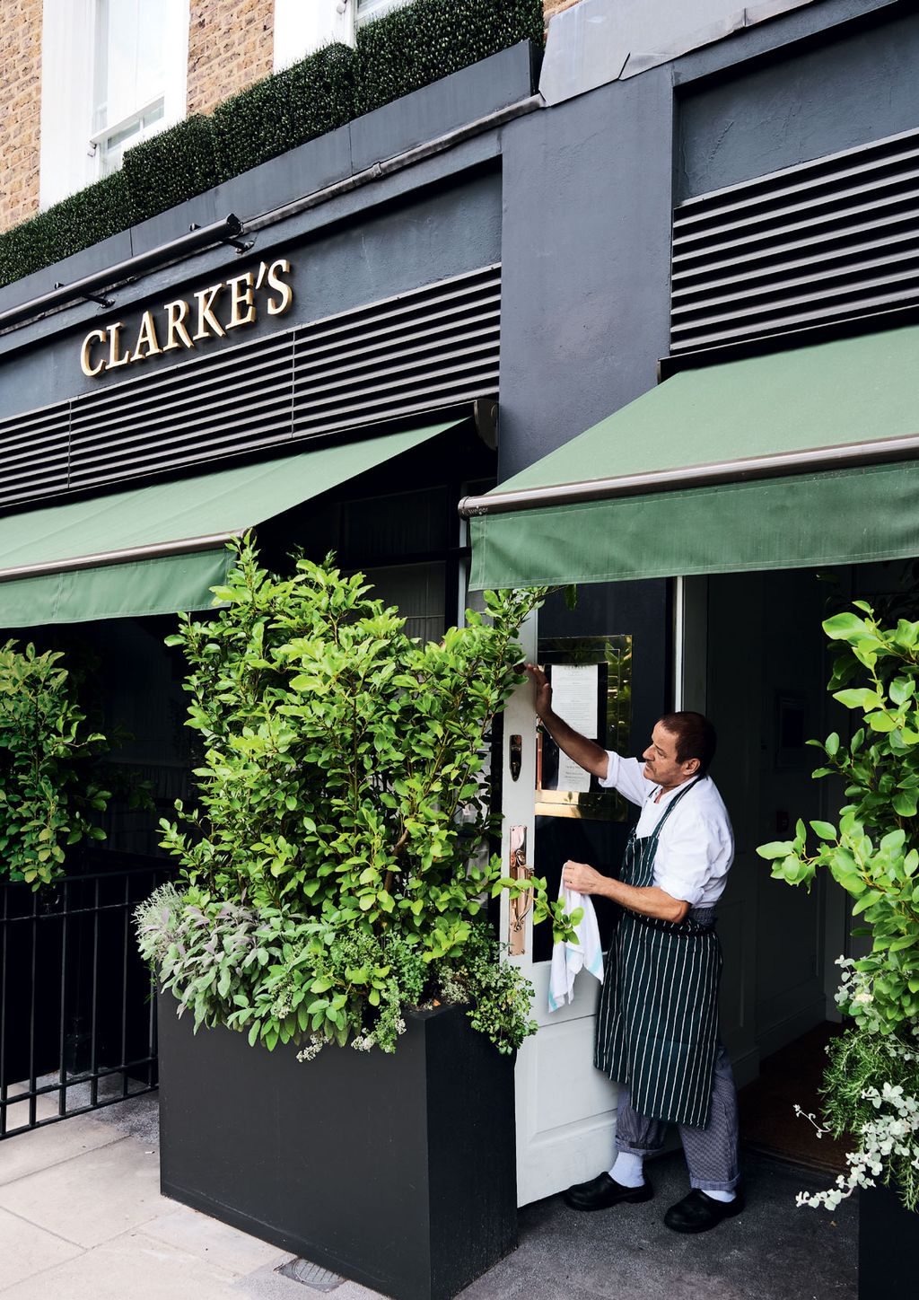 Image may contain Human Person Canopy Awning Footwear Clothing Shoe Apparel and Home Decor