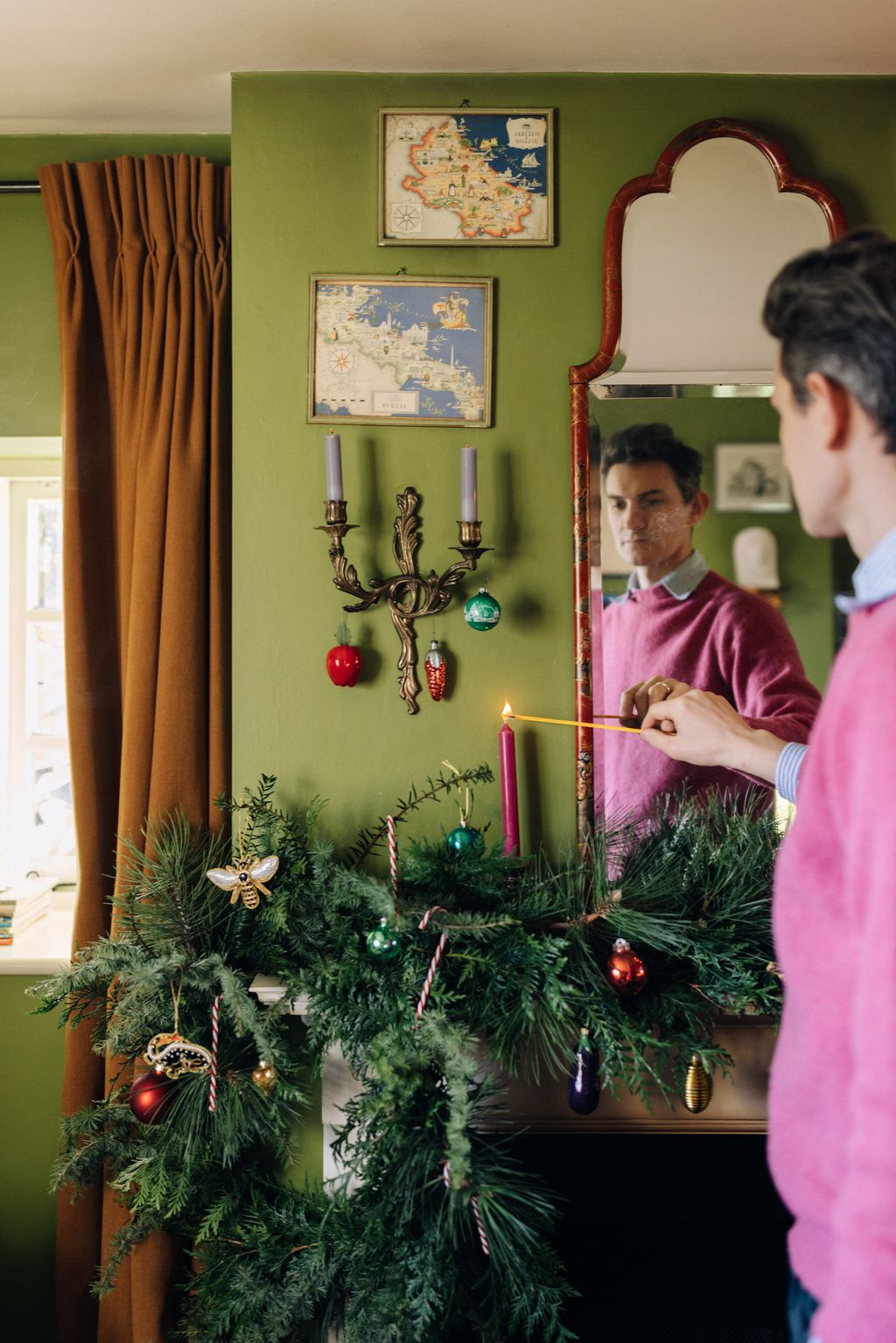 The overmantle mirror is a Queen Anne chinoiserie from Ebury Trading while the curtains are made using a fabric from...