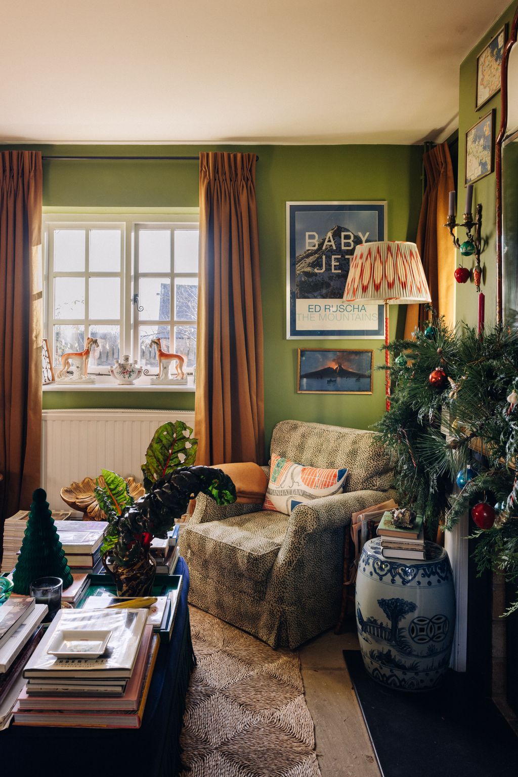 A vintage nbspColefax Fowler chair sits in one corner covered in Colefax's leopard stripe fabric. The chard was picked...