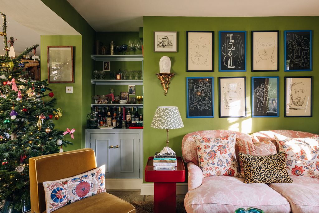 The gold slipper chair was a design by Luke while the red lacquer table is a custom CampbellRey piece.