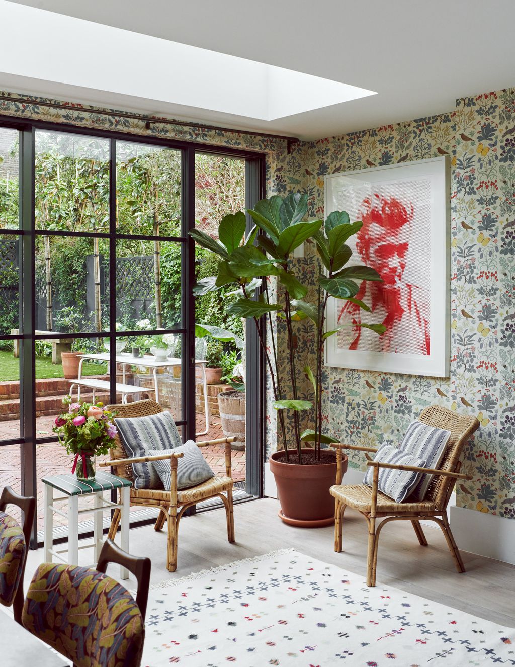 Image may contain Furniture James Dean Interior Design Indoors Cushion Pillow Living Room Room Rug Chair and Table