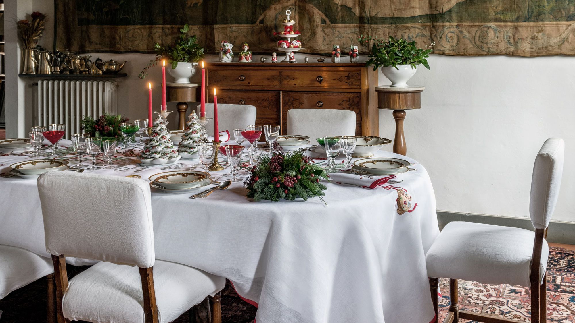 Image may contain Furniture Chair Table Tablecloth Room Indoors Dining Room Dining Table and Home Decor