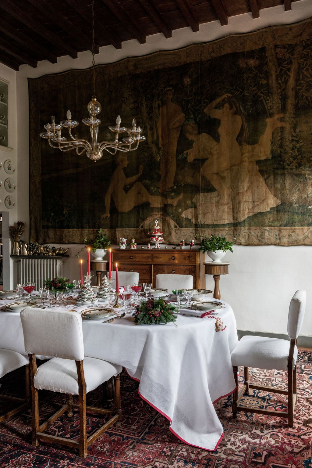 Image may contain Furniture Chair Table Tablecloth Room Indoors Dining Room Dining Table and Home Decor