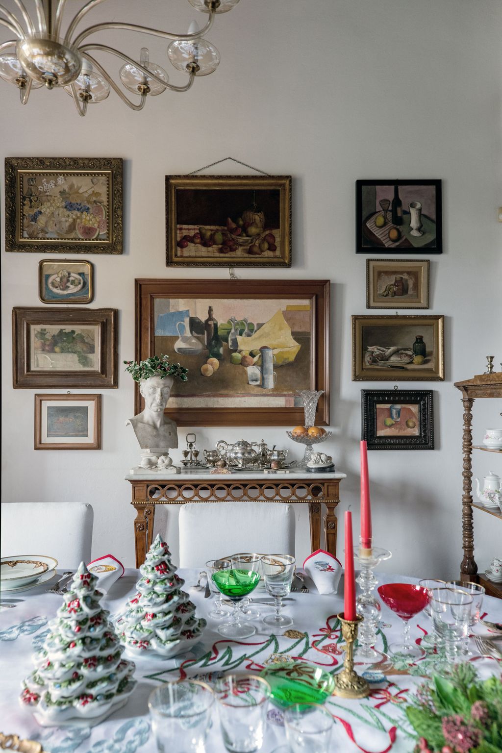 Image may contain Home Decor Furniture Chair Indoors Room Table Dining Room Dining Table Living Room and Pottery